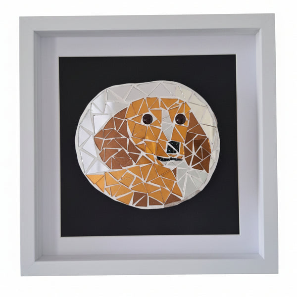 Framed mosaic dog wall art featuring a geometric dog face made of bronze, brown, white, and black triangular mirror pieces, set against a black background and enclosed in a white frame.