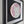 A framed circular mosaic wall art piece featuring a stylized cat face in pink, white, and pale blue geometric segments, mounted on a dark backing inside a black frame.