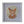A framed mosaic cat head wall art piece, featuring a geometric pattern of orange, brown, and iridescent glass tiles, set within a square white frame.