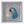 A circular mosaic wall art piece featuring a stylized parrot head in blue, gold, white, and black, mounted inside a square white shadow box frame.