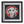 Framed mosaic wall art featuring a stylized dog face made of red, white, and black geometric pieces, mounted on a black square background with a white mat and black frame.