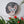 Cat mosaic on the wall surrounded by plants
