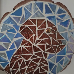 video showing close up of mosaic brown dog face to catch the changing colours and sparkles