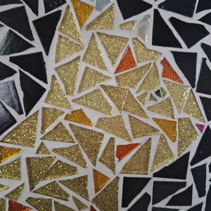 video showing close up of mosaic cat  to catch the changing colours and sparkles