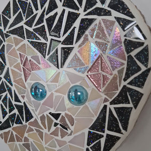 video showing close up of mosaic cat  to catch the changing colours and sparkles