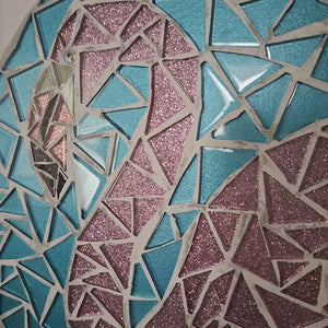 video showing close up of mosaic bird  to catch the changing colours and sparkles