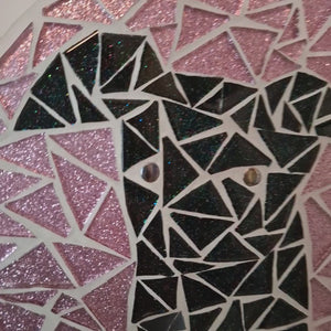 video showing close up of mosaic dog  to catch the changing colours and sparkles