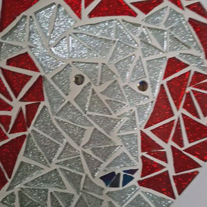video showing close up of mosaic dog to catch the changing colours and sparkles