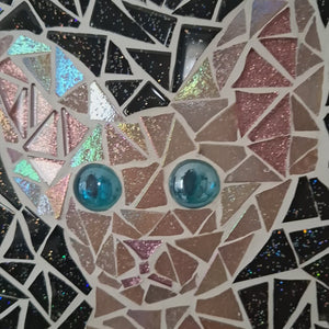 video showing close up of mosaic cat  to catch the changing colours and sparkles