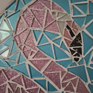 video showing close up of mosaic bird  to catch the changing colours and sparkles